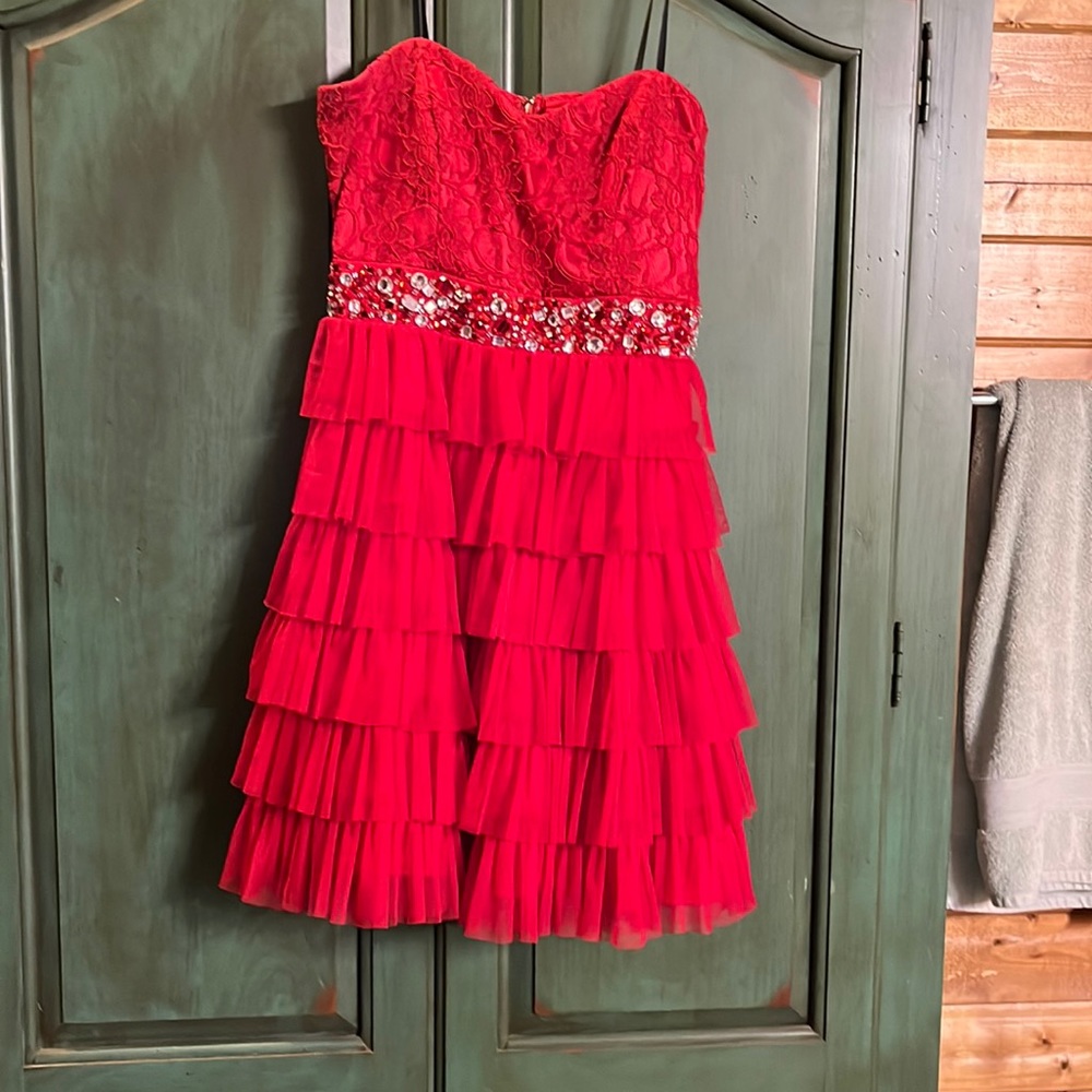 Strapless red homecoming dress.  Lace top with rhinestone waist band in front